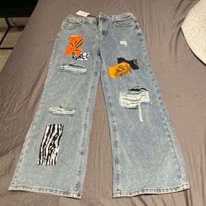 Cider ripped patchy jeans. Brand new with . Size L